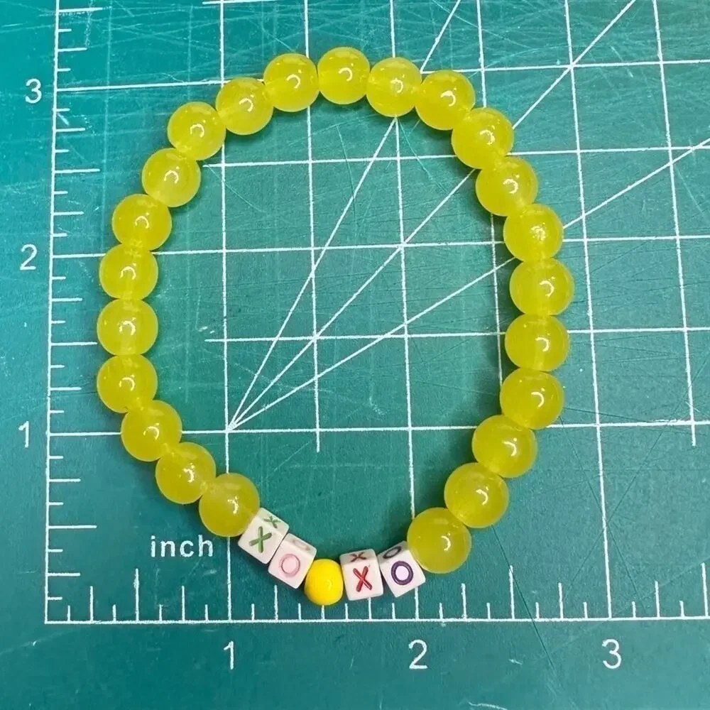 XO yellow handmade bracelet 8mm glass beads friendship